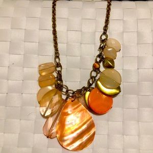 NWT. Beautiful peach stone necklace